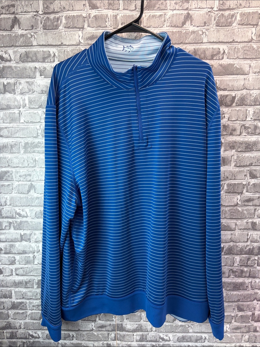 Southern Tide Men's Blue Striped Quarter-Zip‎ shirt.